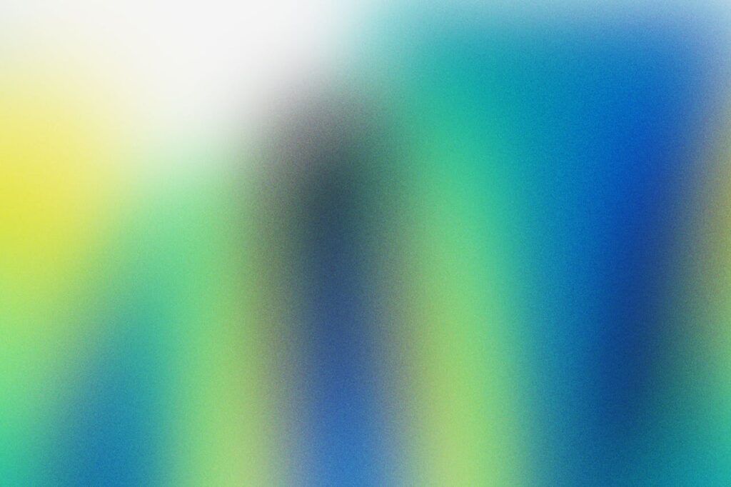 Colorful art piece with fluid gradients in blue, green, and yellow tones.