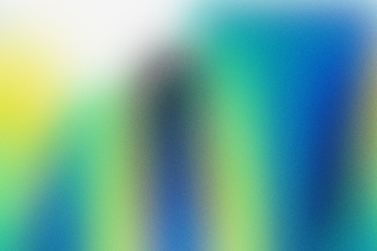 Colorful art piece with fluid gradients in blue, green, and yellow tones.